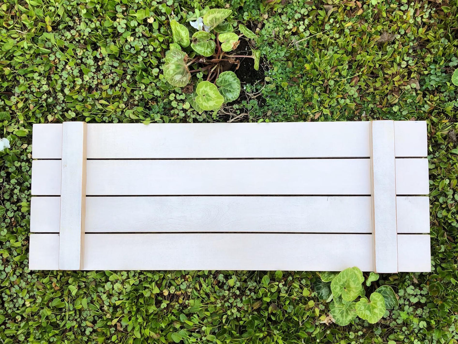 Handmade painted wood bath tray with pressed flowers
